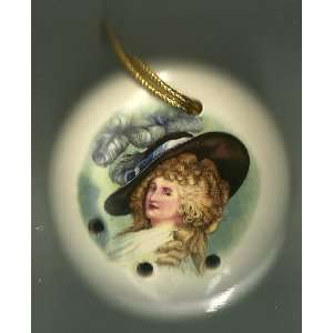   holes in it probably for the salt). small portrait of Marie Antoinette