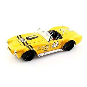  1965 Ford Shelby Cobra 427 1/24 Yellow: Toys & Games