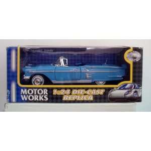   Blue Chevrolet Impala Diecast Scale 1:24 by Motorworks: Toys & Games