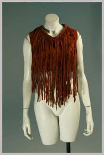   vest top long fringe from braided trim at neck sleeveless metal snaps