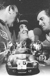   (left) and Bob Bondurant (right) being interviewed after the race