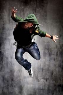 Man wearing jeans and jumping in the air