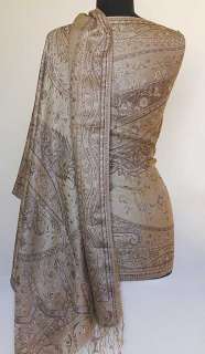 This is an elegant, light weight shawl with a jacquard woven, jamavar 