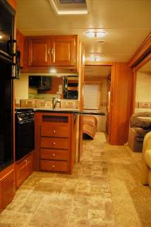 SMALL DOUBLE SLIDE CLASS A GAS RV $ REDUCED $ SHOW PRICE SMALL DOUBLE 