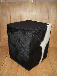 Hocker Kuhfell schwarz weiß, Sitzfläche mit schwarzen Filz  