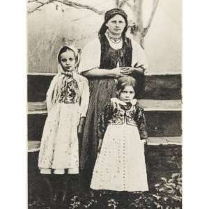  A Russian Peasant Woman and Two Girls in Traditional 